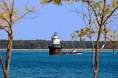 Lobsterboat Passes By Butler Flats Lighthouse in Massachusetts